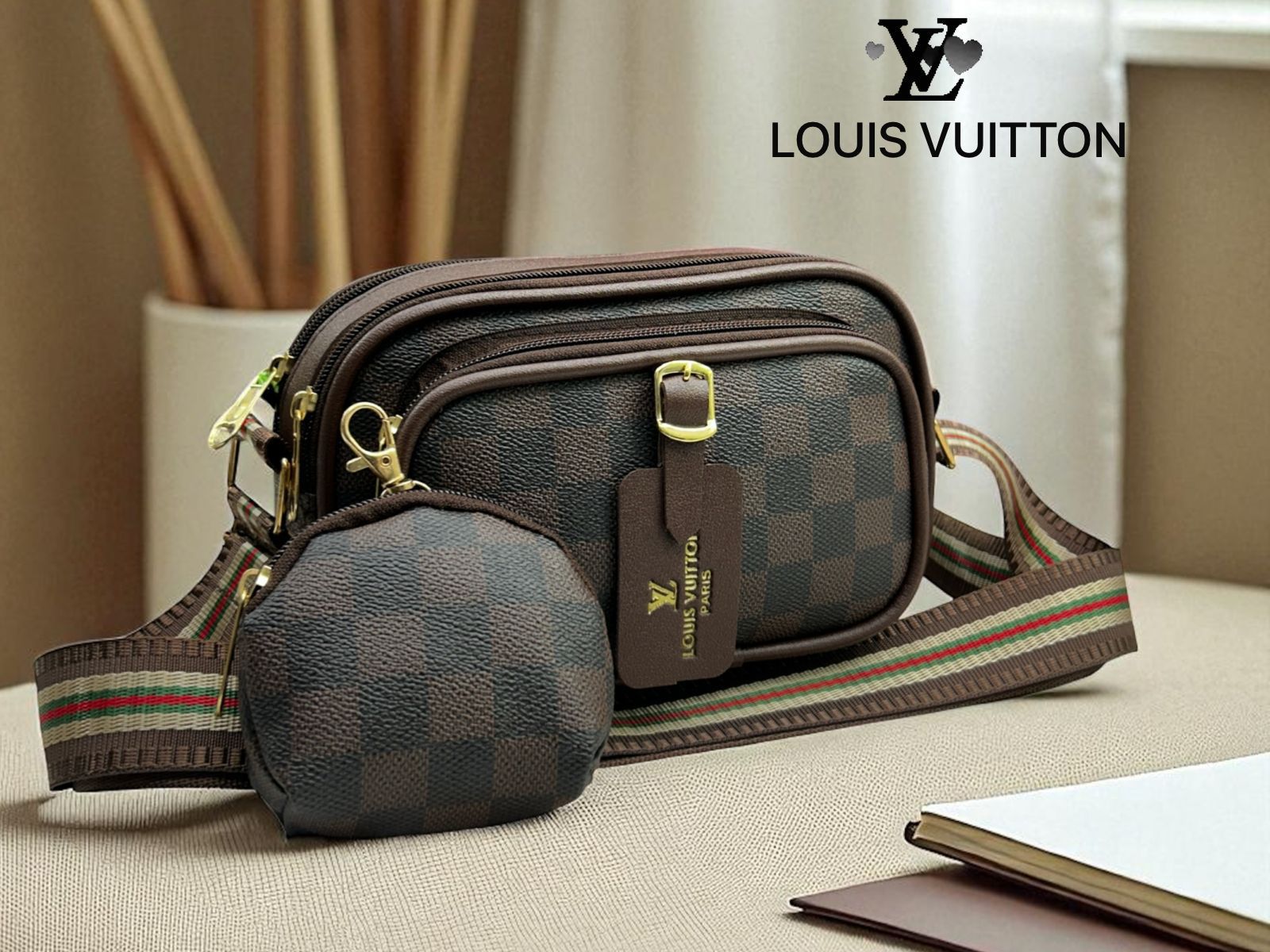 Louis Vuitton style brown checkered damier pattern sling bag with coin pouch and striped strap on a table.