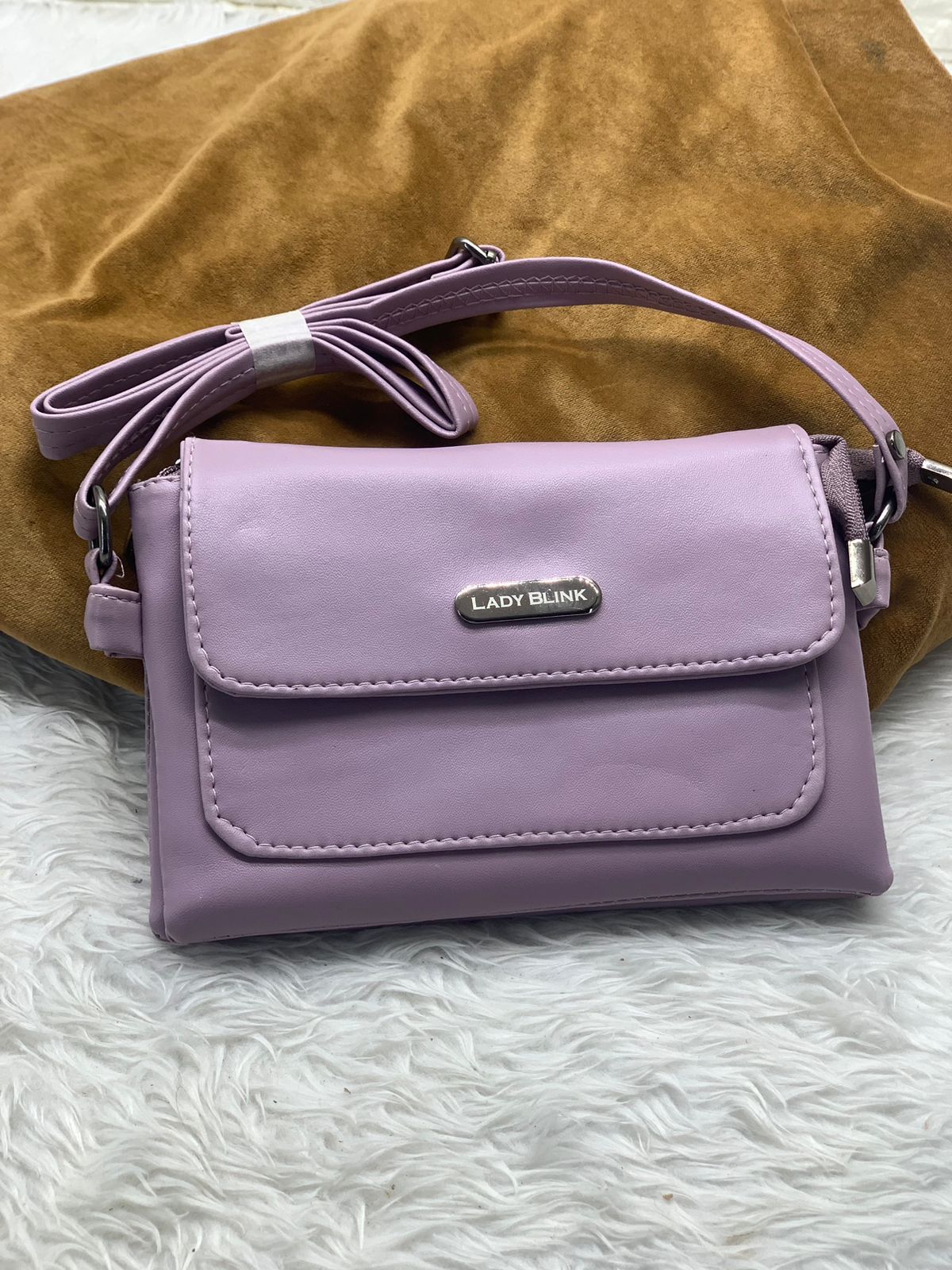 TRENDBUY lavender purple PU leather sling bag, elegant and compact crossbody style.