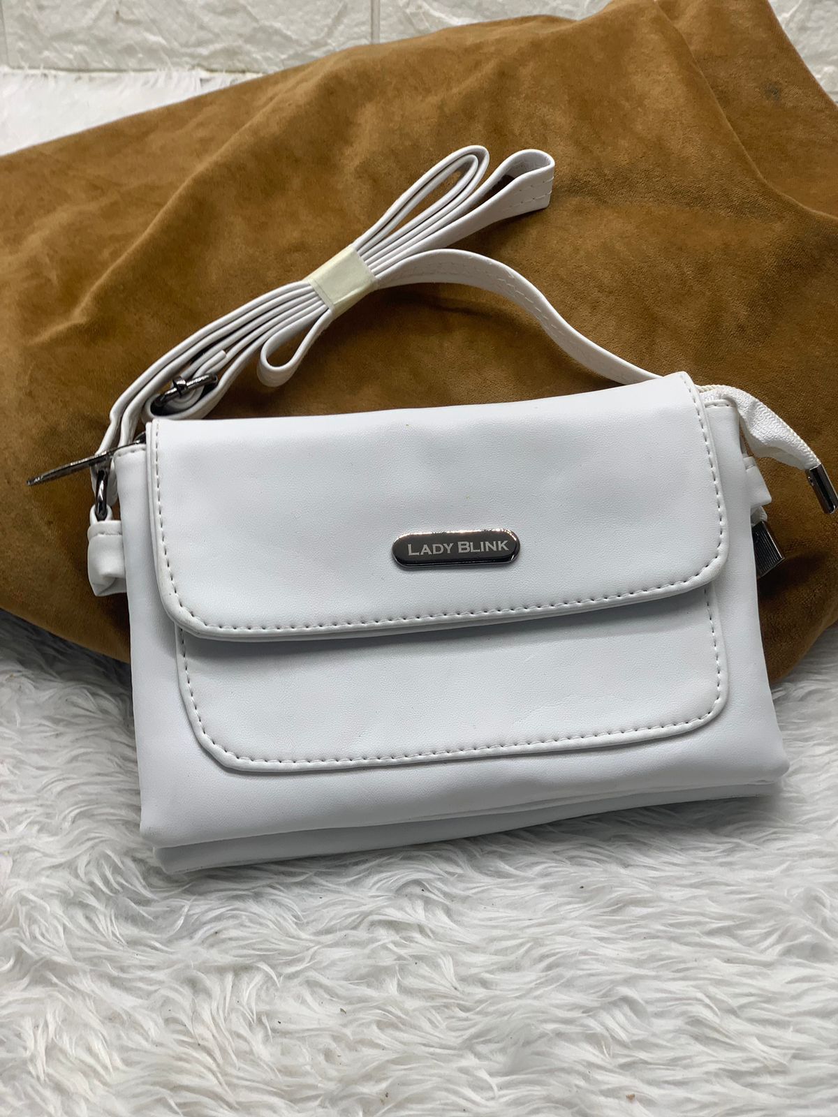 TRENDBUY crisp white PU leather sling bag, a versatile and chic crossbody option.