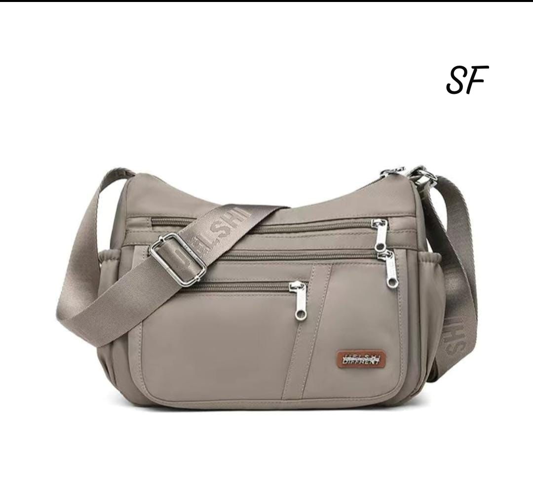 TRENDBUY Khaki Taupe Imported Shoulder Bag, displaying its soft texture and organized compartments.