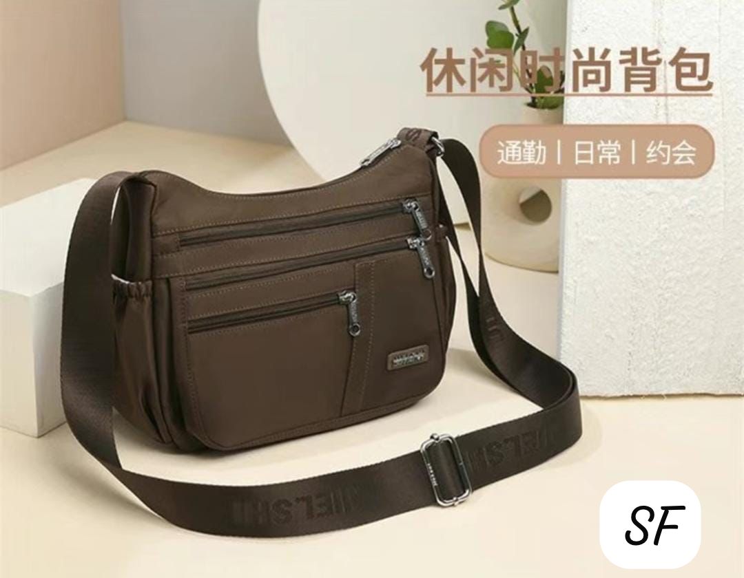 TRENDBUY Brown Imported Sling Bag styled on a minimalist backdrop, highlighting its casual yet chic appeal.