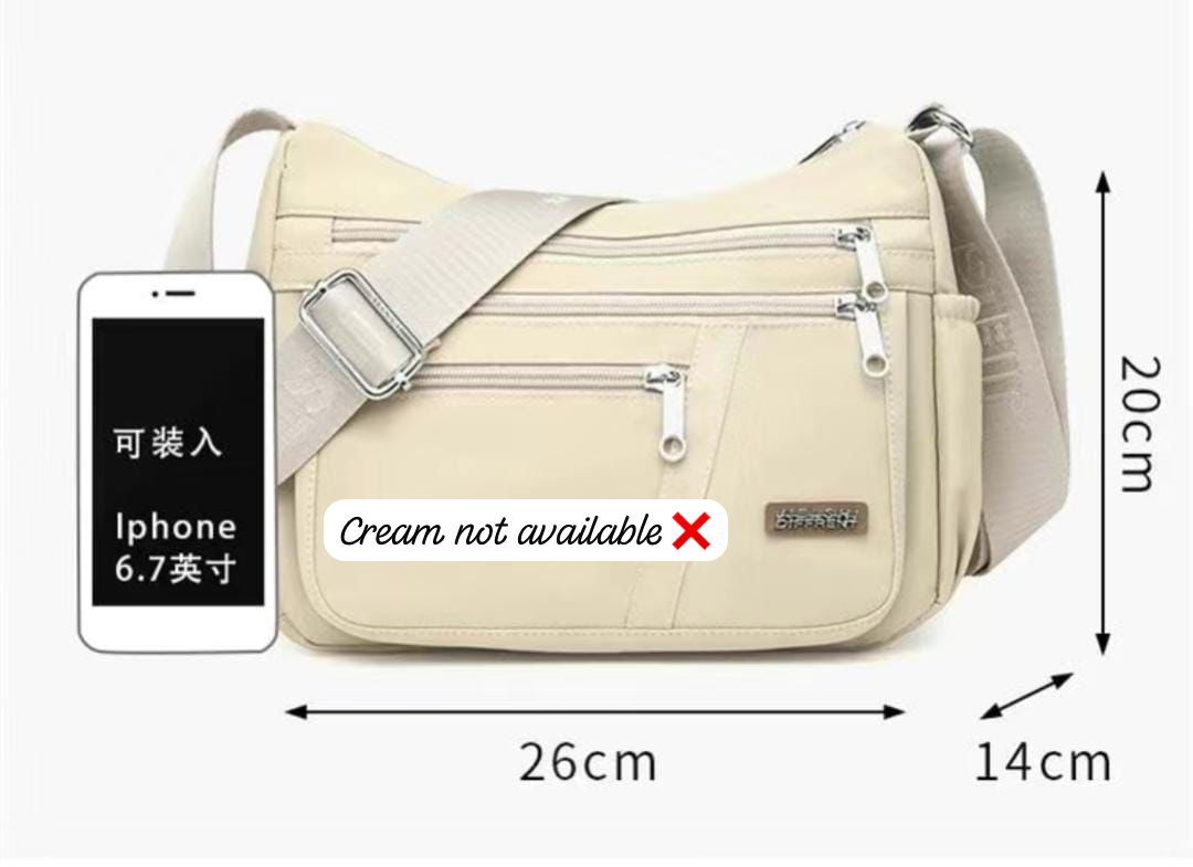 Dimensions of a premium sling bag in centimeters (26cm L x 20cm H x 14cm W) with a smartphone for size comparison, emphasizing its compact yet spacious design.