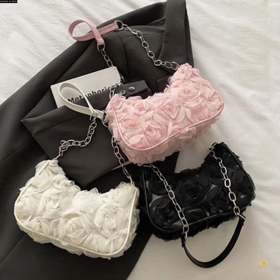 Collection of TRENDBUY Charles & Keith style 3D rose textured sling bags in white, pink, and black, against a dark blazer.
