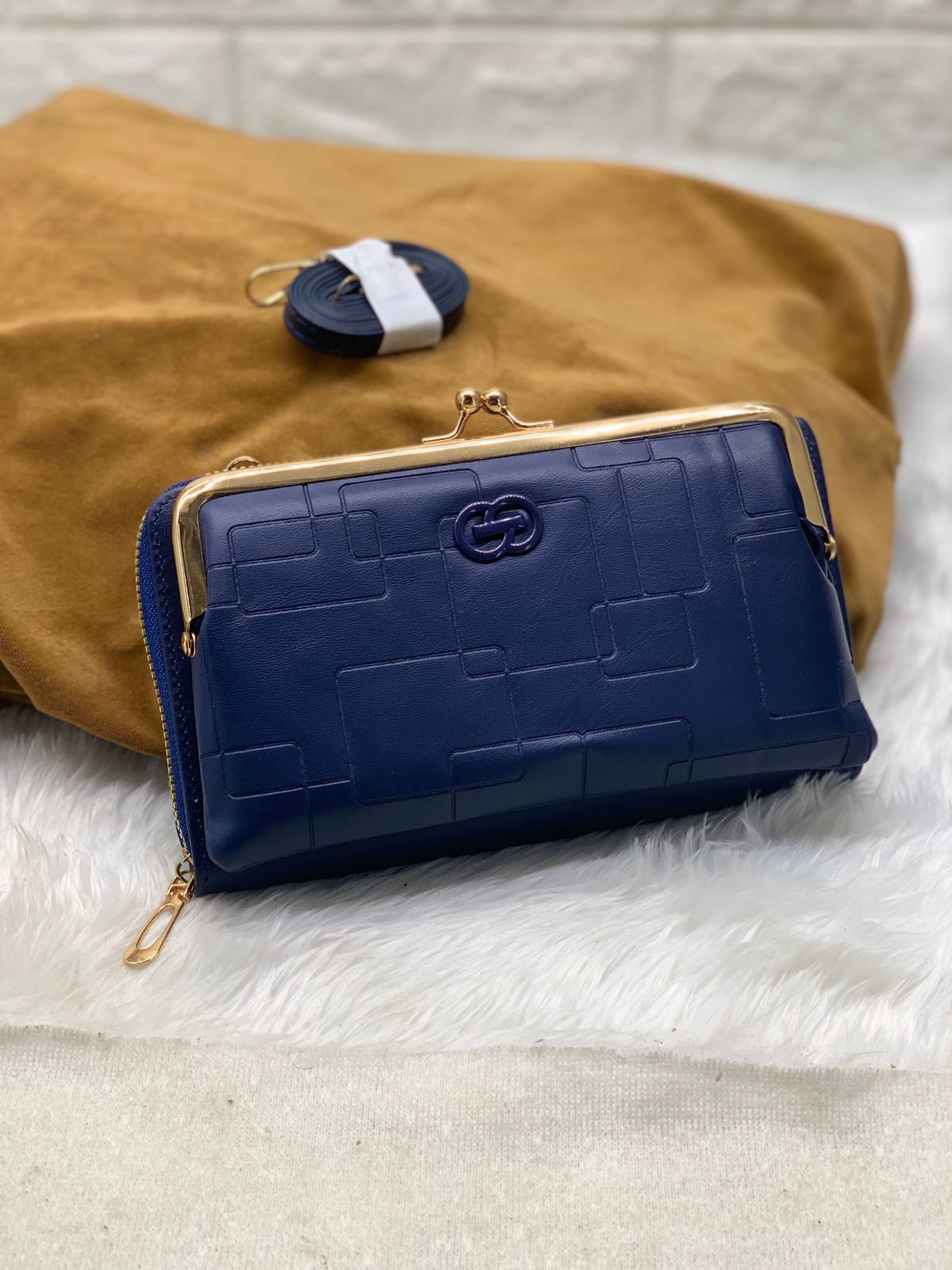 TRENDBUY navy blue PU leather wallet sling bag featuring embossed pattern and gold details.