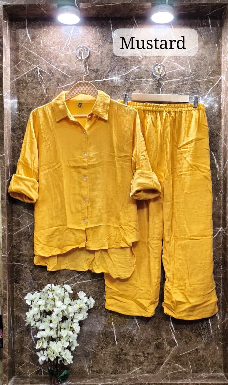 Cheerful Mustard Yellow Mul Mul Cotton Cord Set, labeled 'Mustard', enhancing any wardrobe on marble.