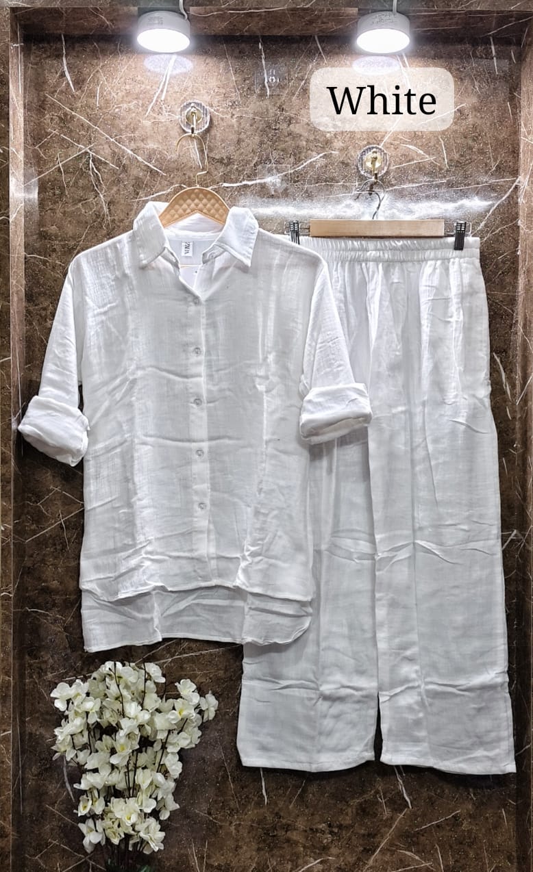 Crisp White Mul Mul Cotton Cord Set, labeled 'White', embodying pure elegance on a marble surface.