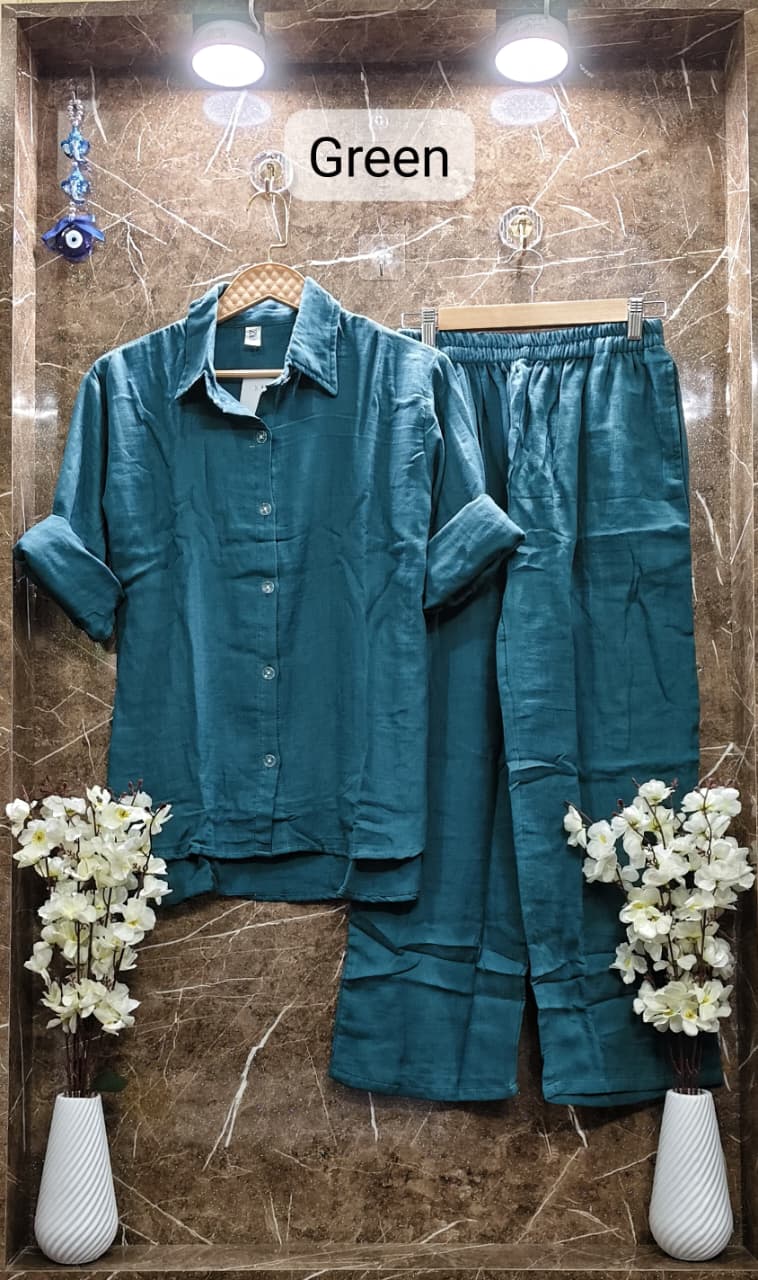 Deep Teal Green Mul Mul Cotton Cord Set, labeled 'Green', presenting a rich hue with white flowers.