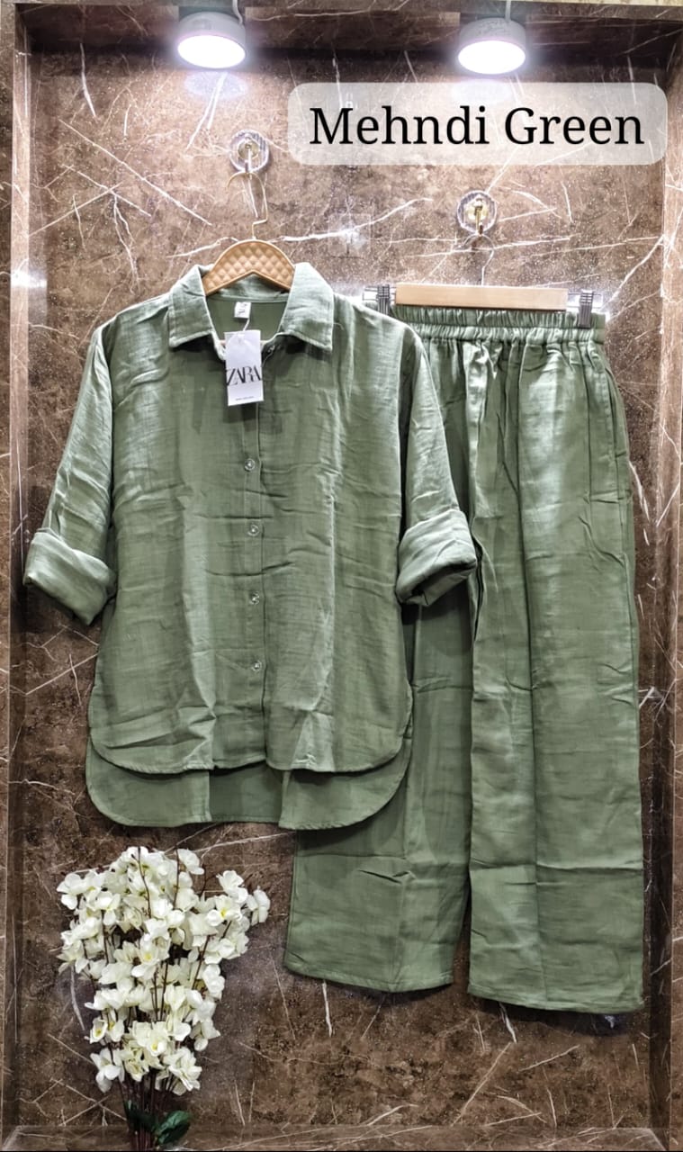 Natural Mehndi Green Mul Mul Cotton Cord Set, labeled, blending traditional charm with modern style on marble.