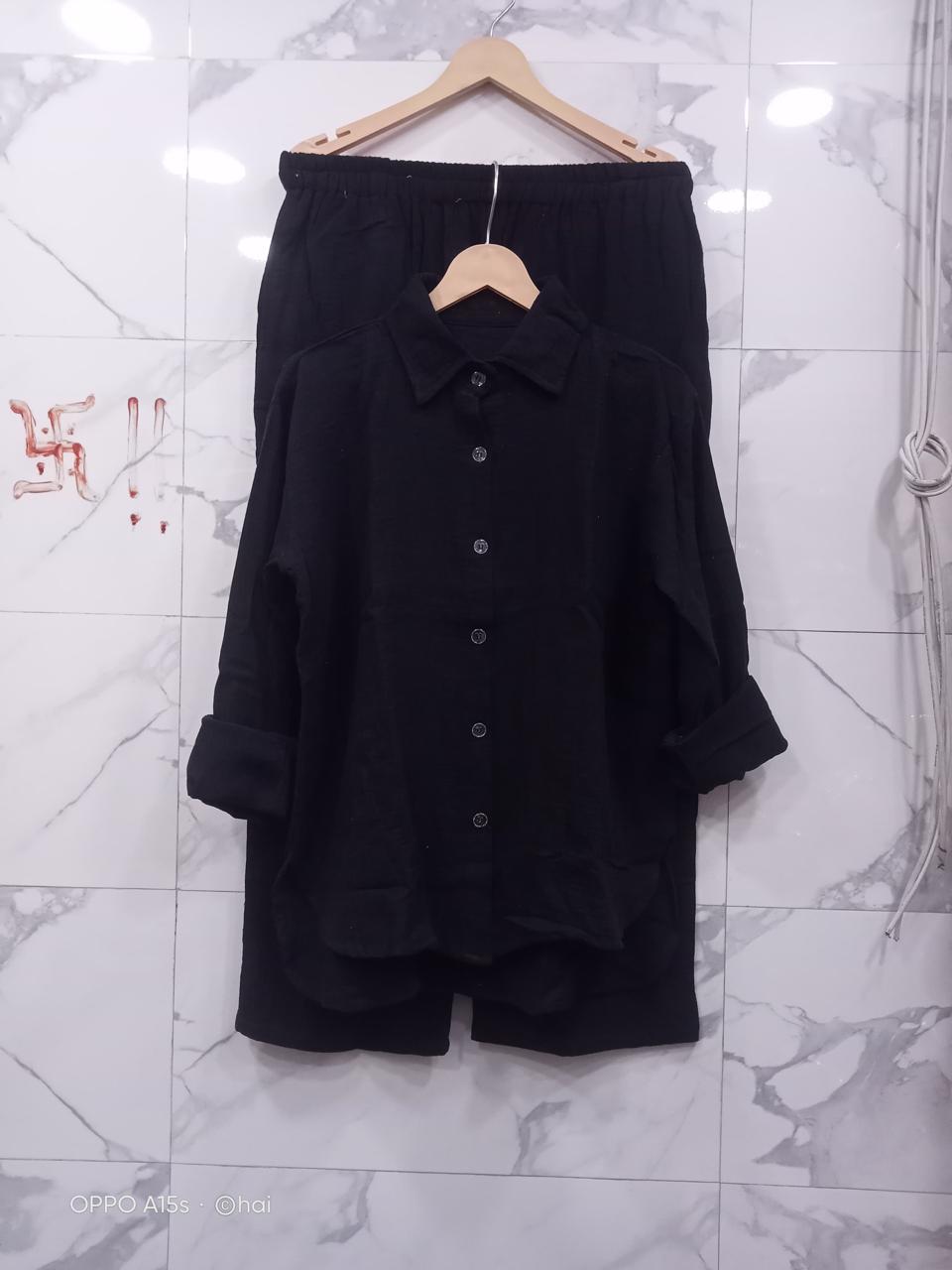 Full view of Classic Black Mul Mul Cotton Cord Set, showcasing the complete look on a white marble surface.