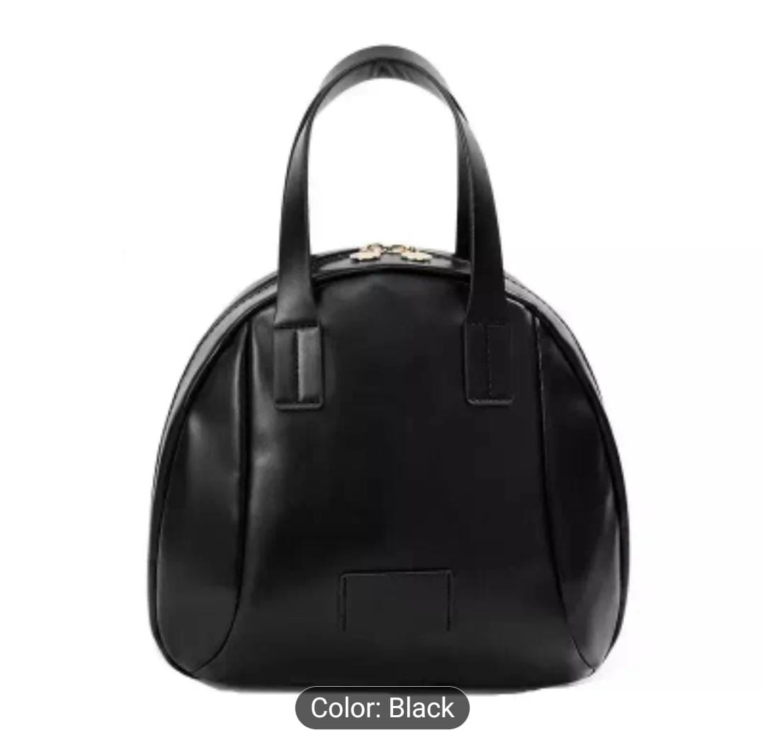 Front view of a sleek black large capacity PU leather cosmetic bag with top handles and a zipper closure.