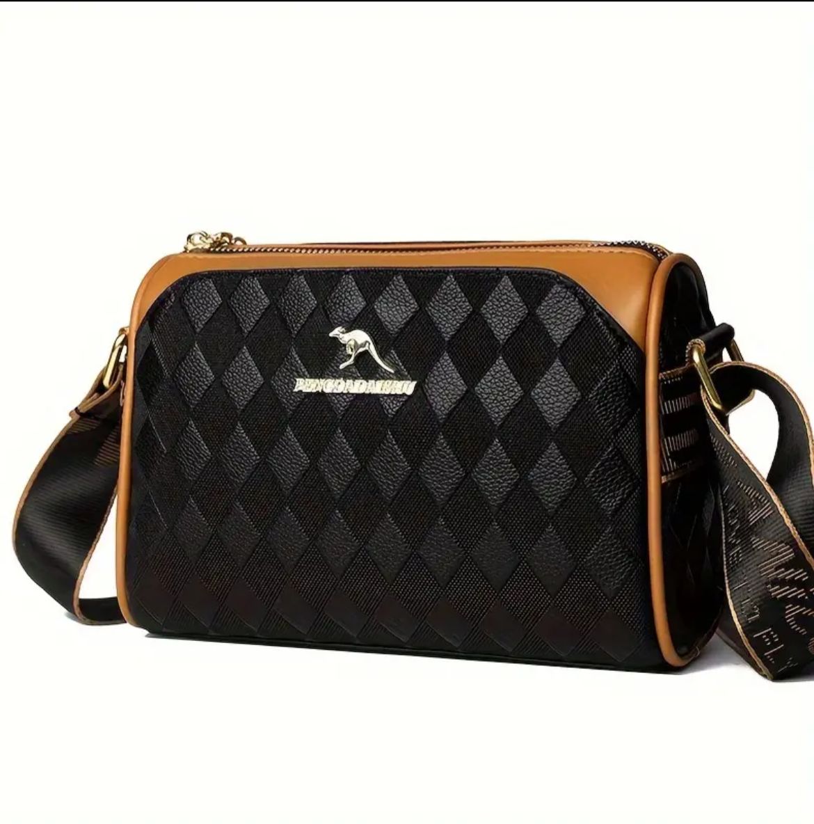 Frontal close-up of TRENDBUY black geometric Boston sling bag with gold kangaroo logo.