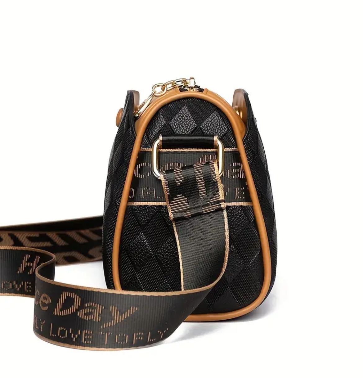 Side profile of TRENDBUY black geometric sling bag, showcasing depth and strap attachment.