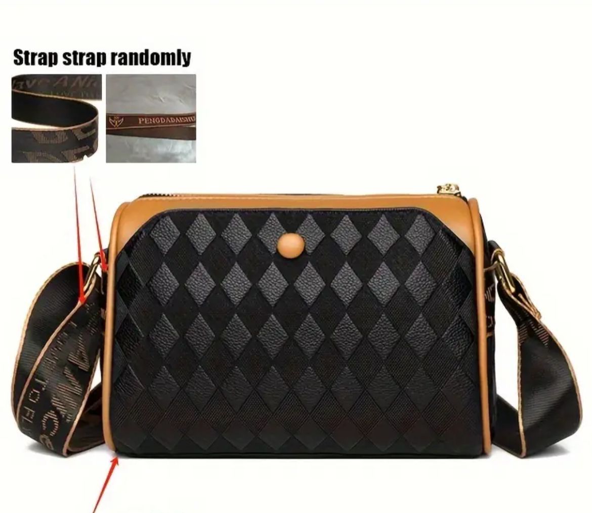 Back view of TRENDBUY black geometric sling bag showing strap detail and rear snap closure.