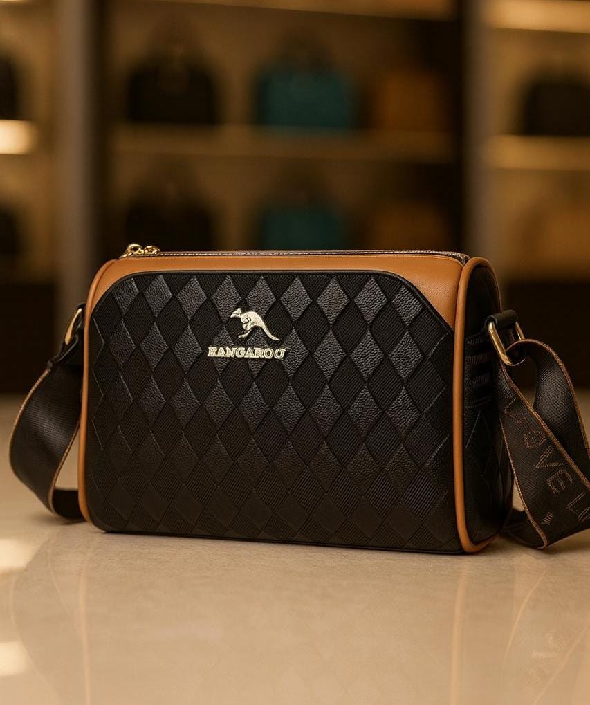 TRENDBUY black geometric Boston sling bag on display, highlighting textured pattern and strap details from an elegant angle.