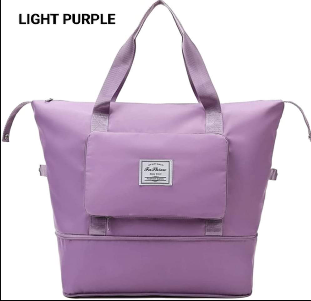Lavender large capacity duffle bag with a convenient front pocket.
