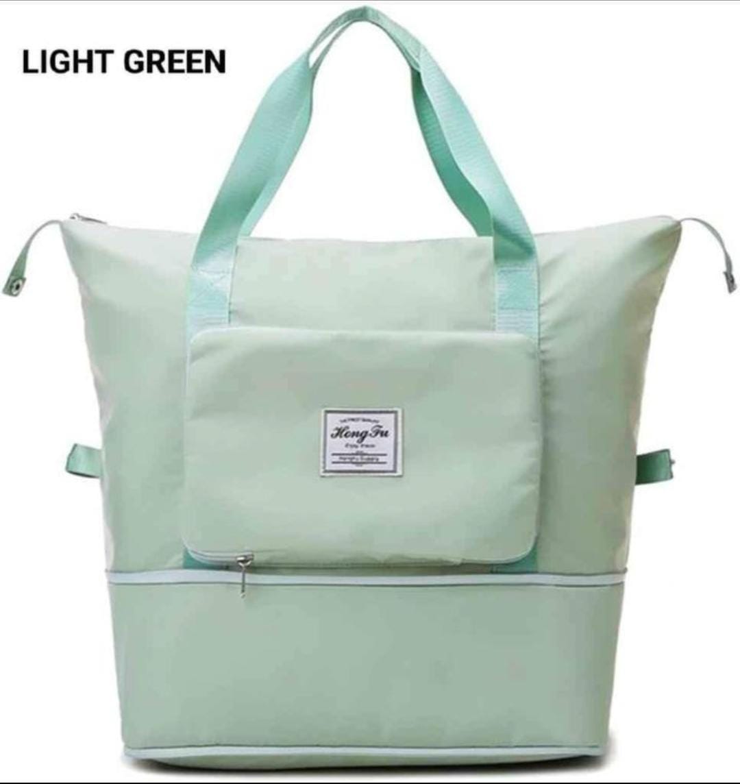 Mint Green waterproof travel bag, ready for a trip.