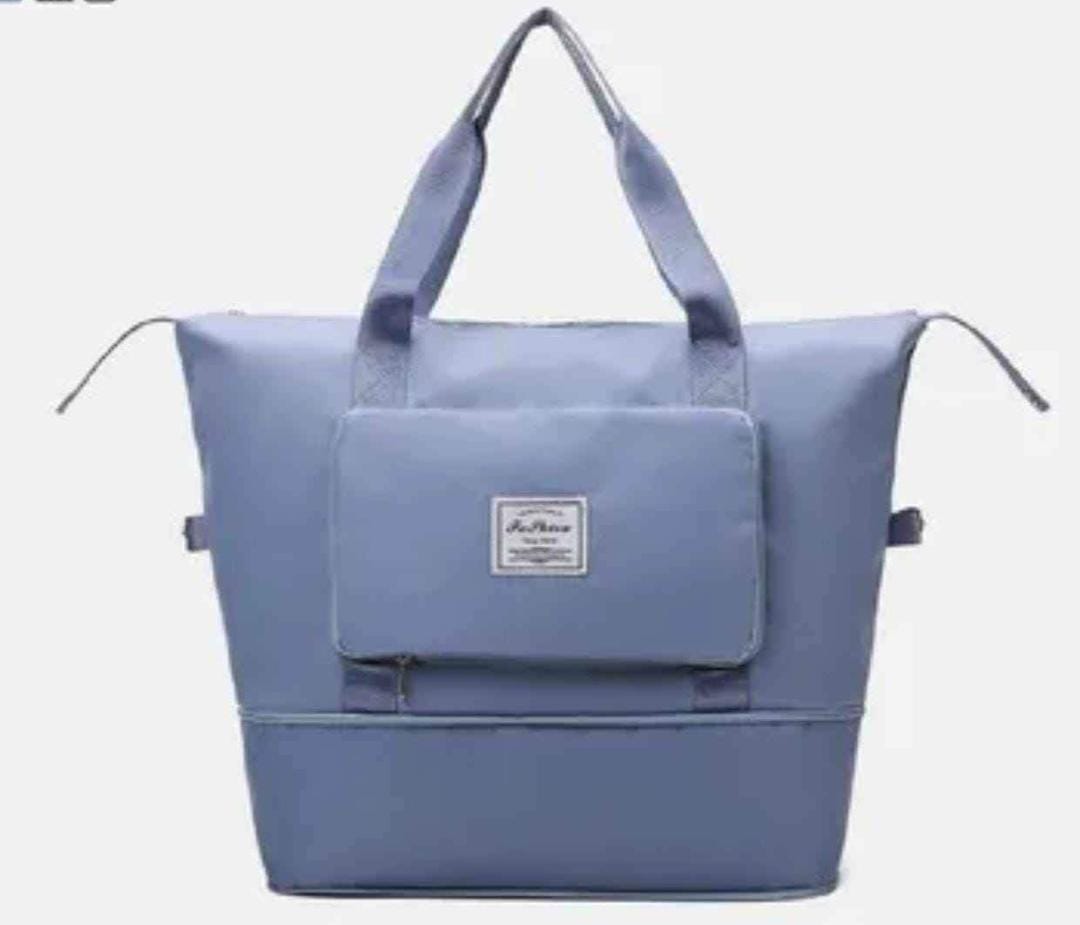 Slate Blue expandable travel duffle bag, designed for versatility.