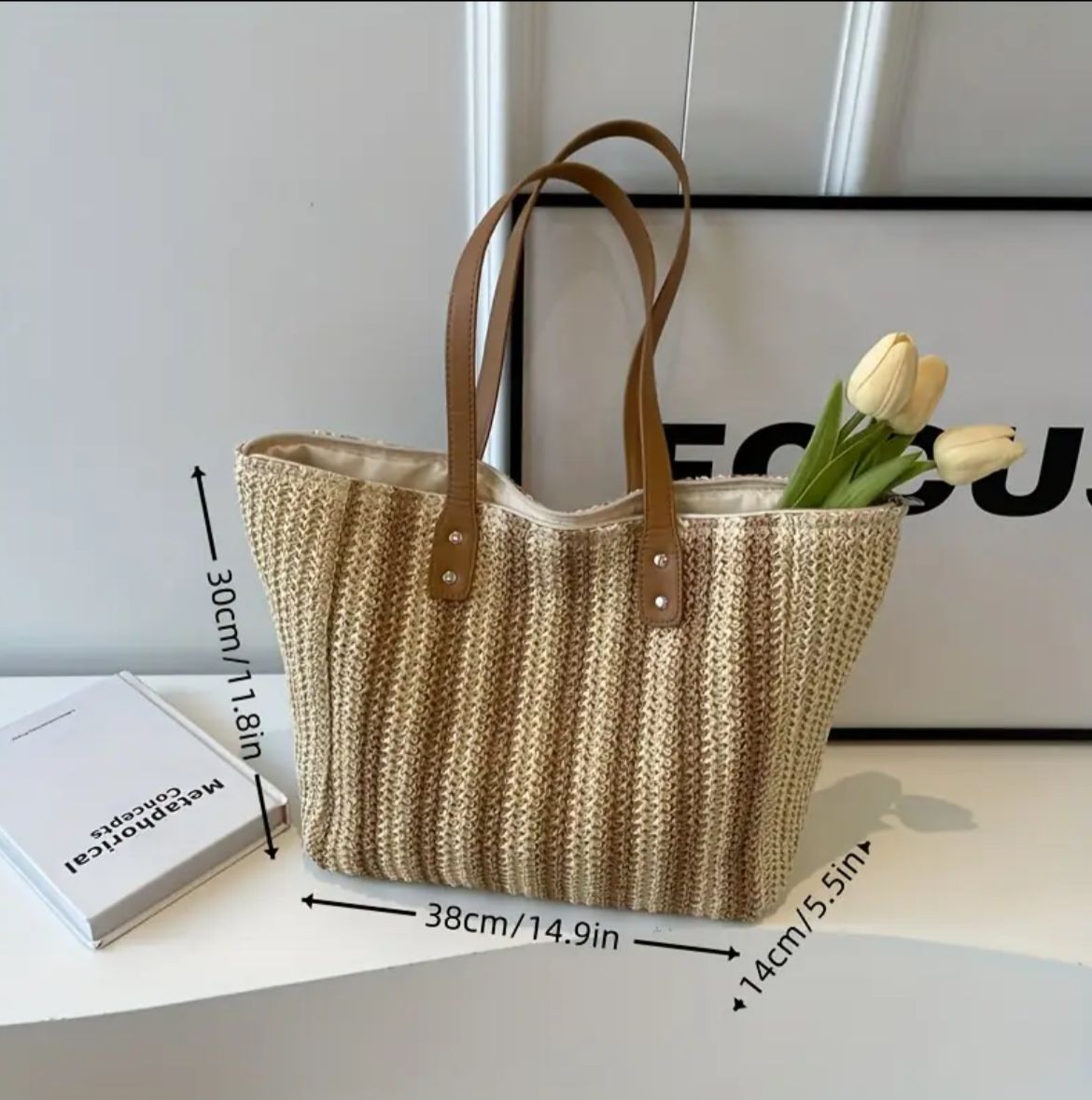 Khaki striped jute tote bag displaying its dimensions (38cm/14.9in wide, 30cm/11.8in high, 14cm/5.5in deep) filled with tulips.
