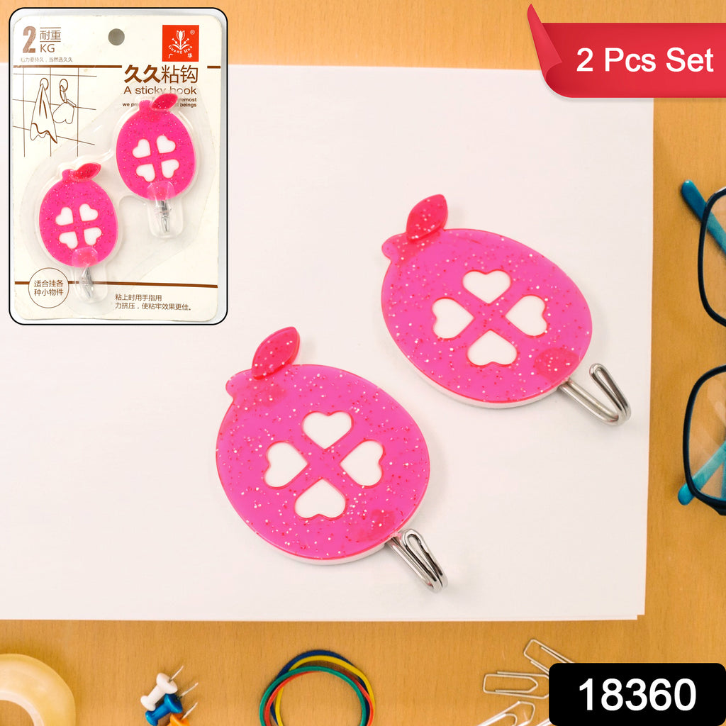 Multipurpose self-adhesive hooks (2 pc set) with a clear design, securely holding a towel. Easy no-drill installation.