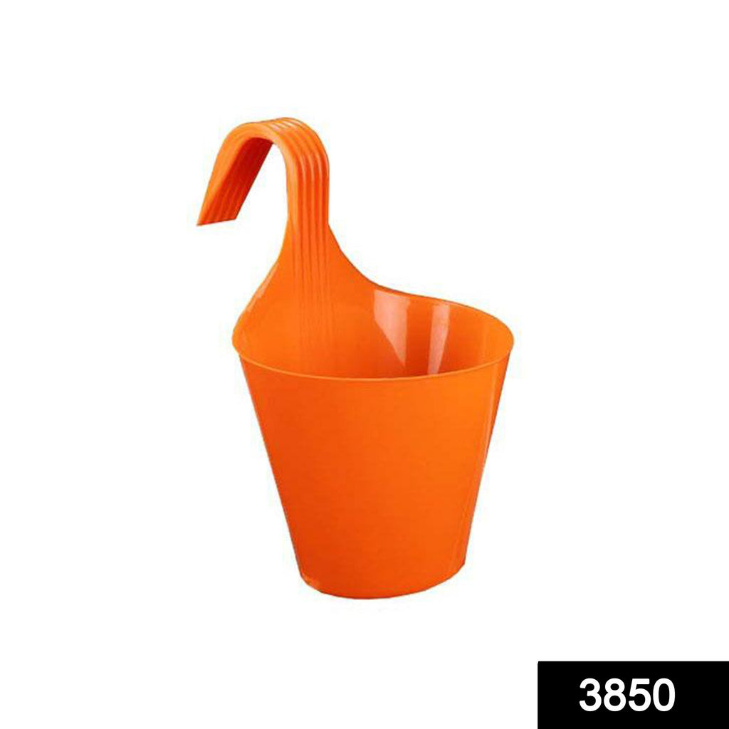Round plastic hanging planter pots in a vibrant multicolour assortment.