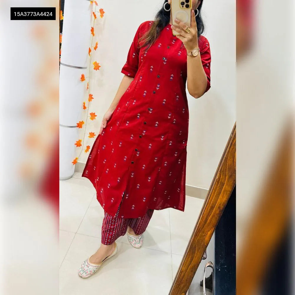 Woman posing in a Scarlet Red digital print A-line kurti and ankle length pant co-ord set, front view.