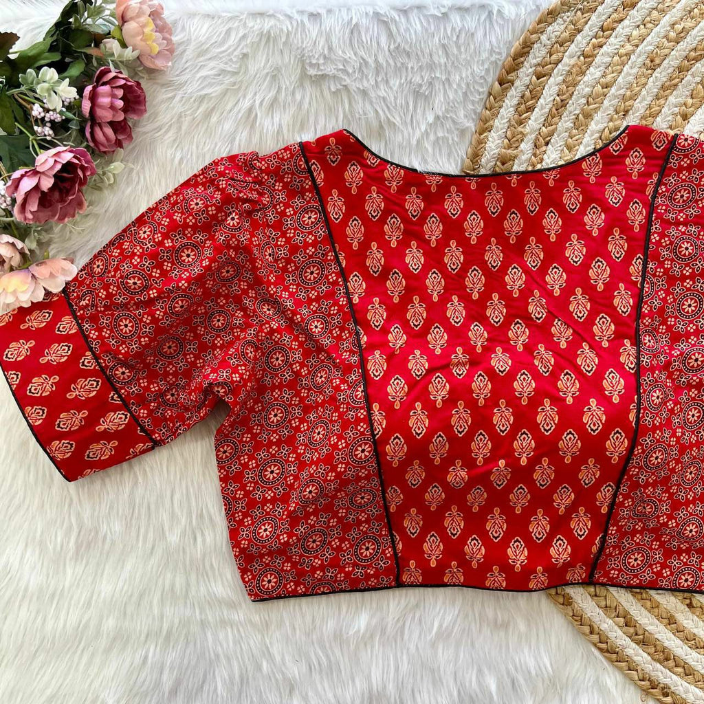Green Ajrakh print cotton blouse with puff sleeves, front view.