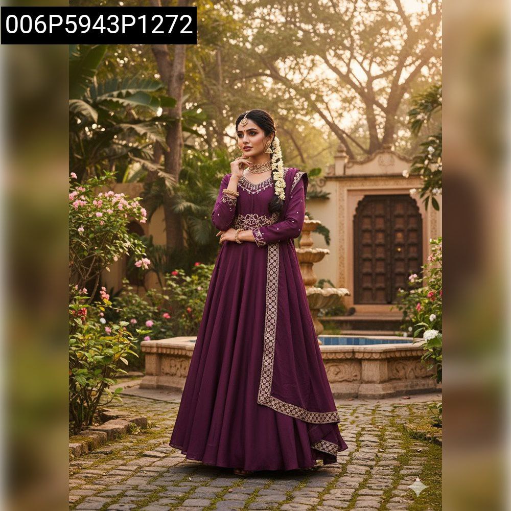 Full shot of model in wine purple Anarkali suit with golden embroidery, front facing, standing in a lush garden setting.