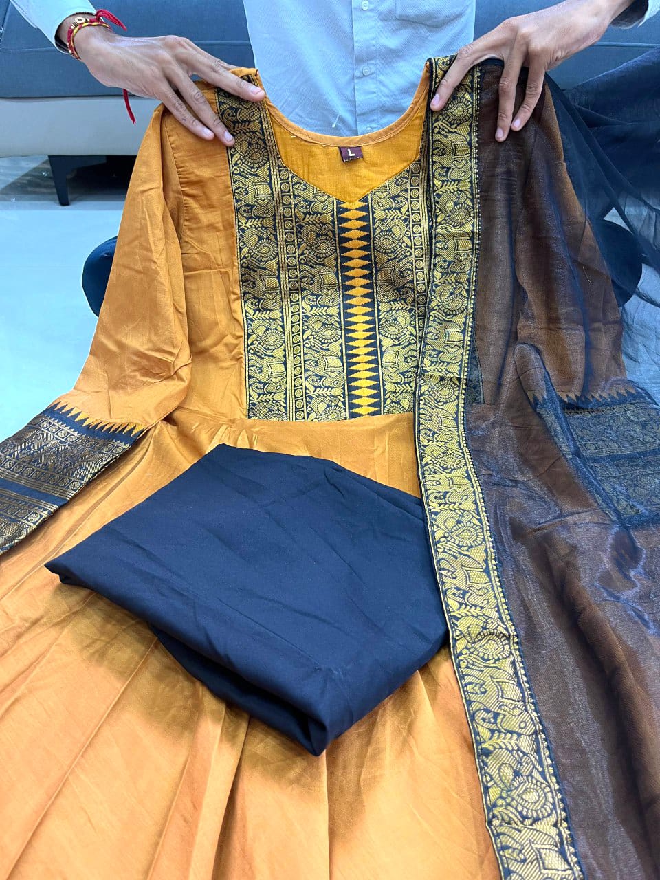 TRENDBUY Anarkali Gown set in mustard with black pants and dupatta, detailed yoke.