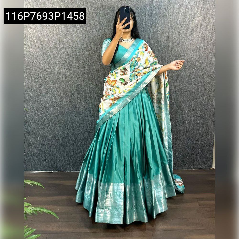 Full-length shot of a model wearing Teal Green Aura Silk Narayanpet Patta Lehenga Choli with a vibrant printed Tusser Silk dupatta.