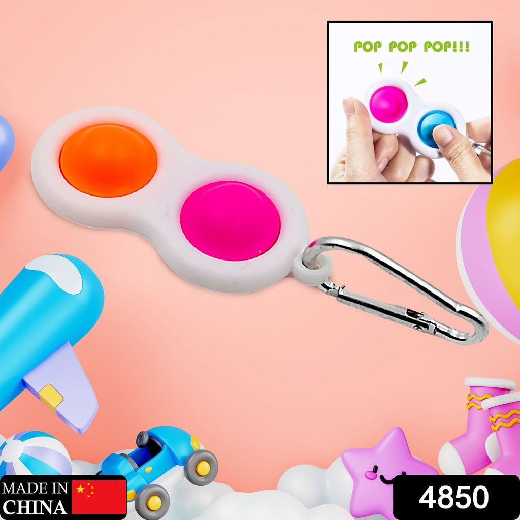 Colorful Simple Dimple Fidget Toy Mini Keychain with silicone bubbles.