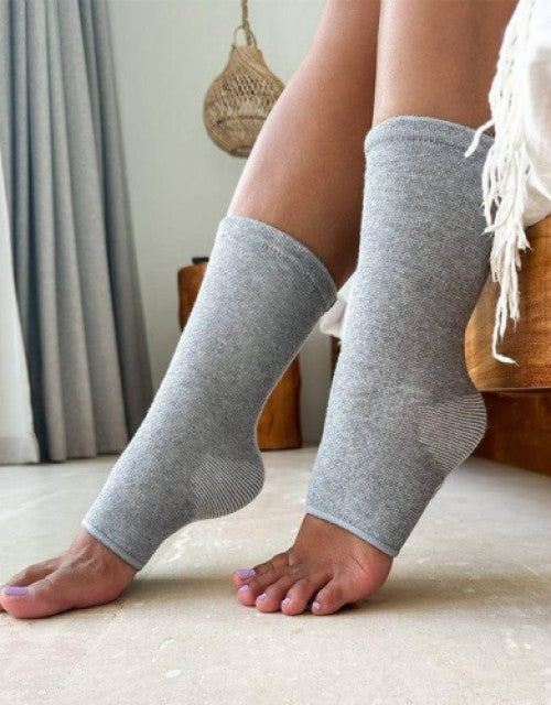Pair of bamboo compression socks, emphasizing soft, breathable comfort and support.
