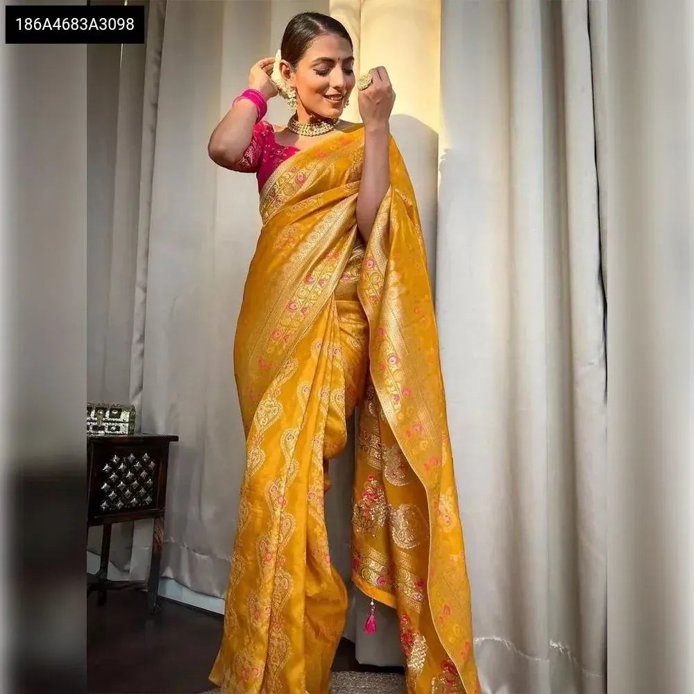 TRENDBUY Banarasi Soft Silk Saree in Mustard Yellow, full length front pose, vibrant and eye-catching.