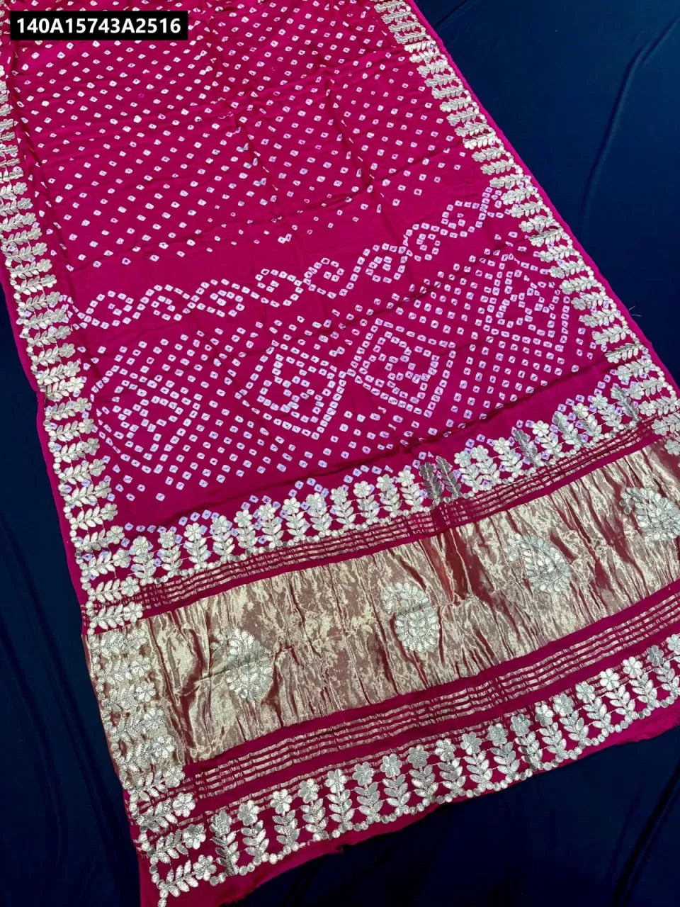 Magenta Pure Gajji Silk Bandhani Saree with Gota Patti border and pallu spread out