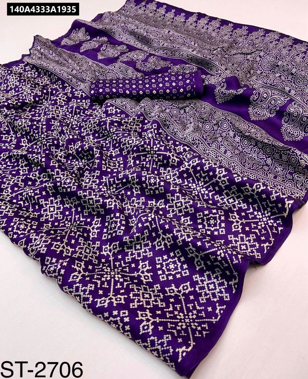Draped AJRrakh Gajji Bandhej Soft Silk Saree in Violet with Paisley Border