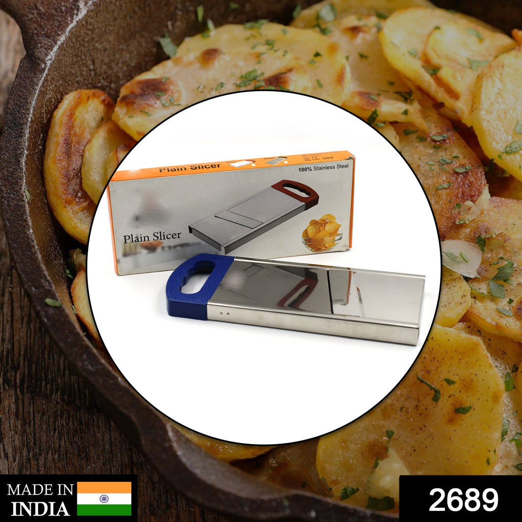 Manual potato slicer cutting a potato into uniform sticks for household kitchen use.