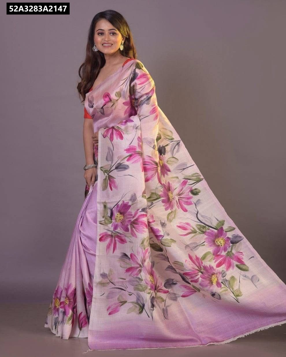Woman wearing a lavender pink Bishnupuri Tussar saree with pink and purple floral hand painting, smiling.