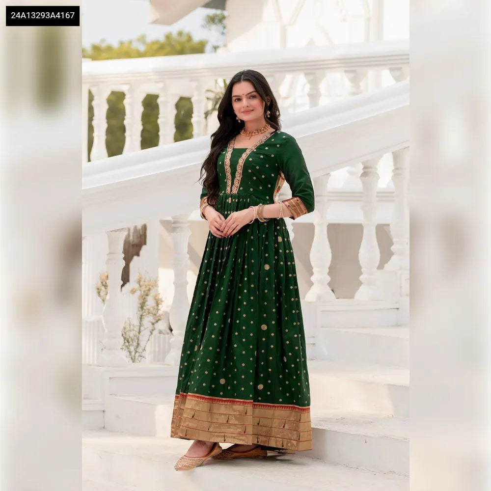 Front view of model standing in TRENDBUY Bottle Green Polka Paithani Gown, showcasing the full length and elegant silhouette.