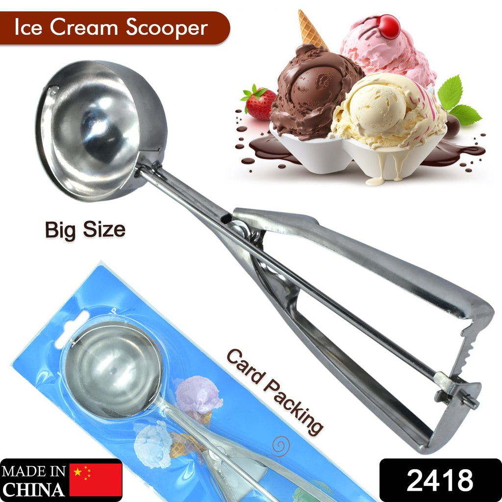 Premium stainless steel ice cream serving scoop with trigger release, scooping ice cream.