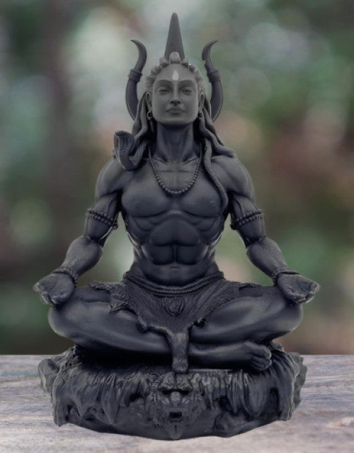 Car dashboard ornament featuring Shiva and Shakti Hindu deity idols