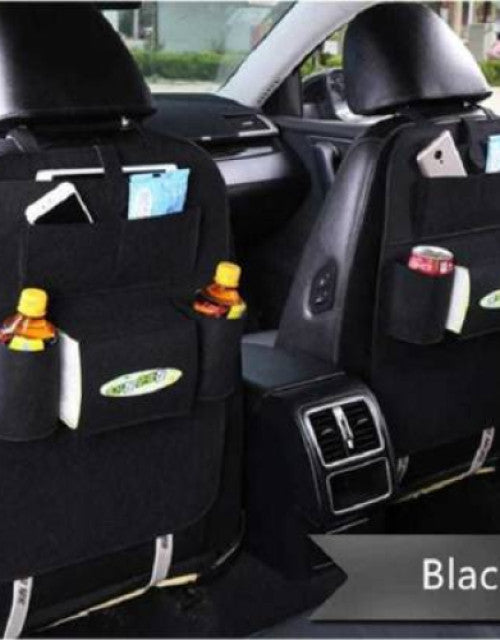 Black 4 L car storage bag organizer installed between car seats for convenient storage