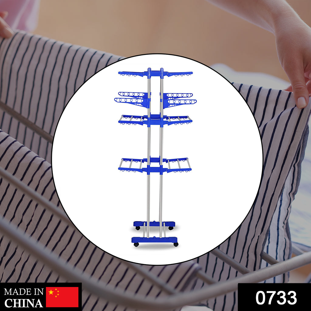 0733 Stainless Steel Cloth Drying Stand in use, with various clothes drying on its multi-level racks.