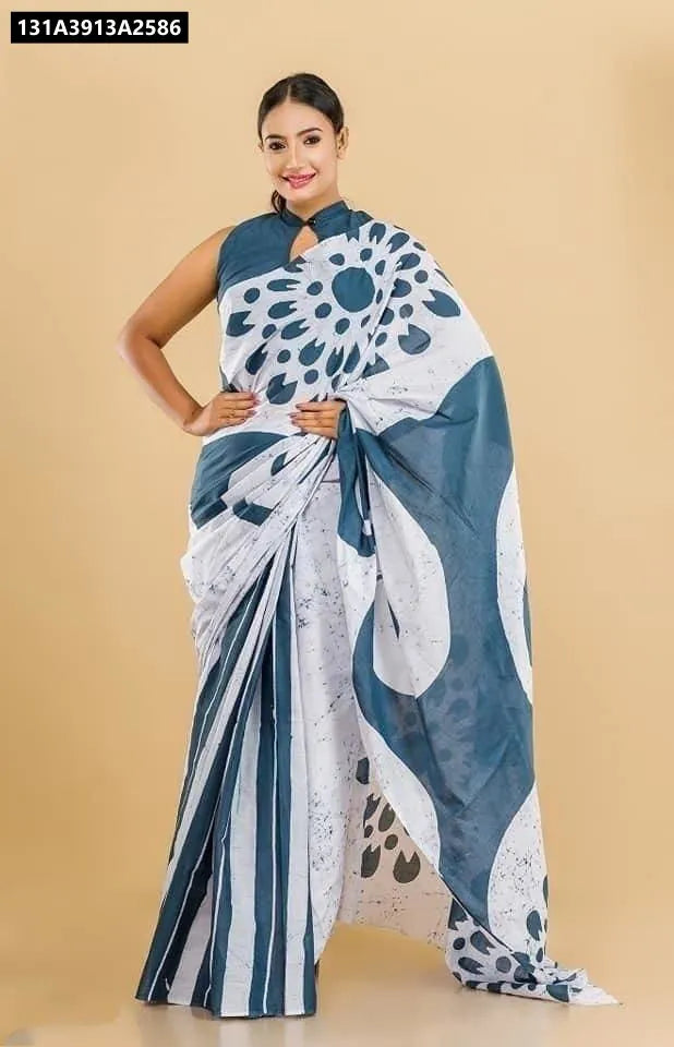 Model wearing TRENDBUY Chanderi Cotton Batik Print Saree in White and Teal, front view.