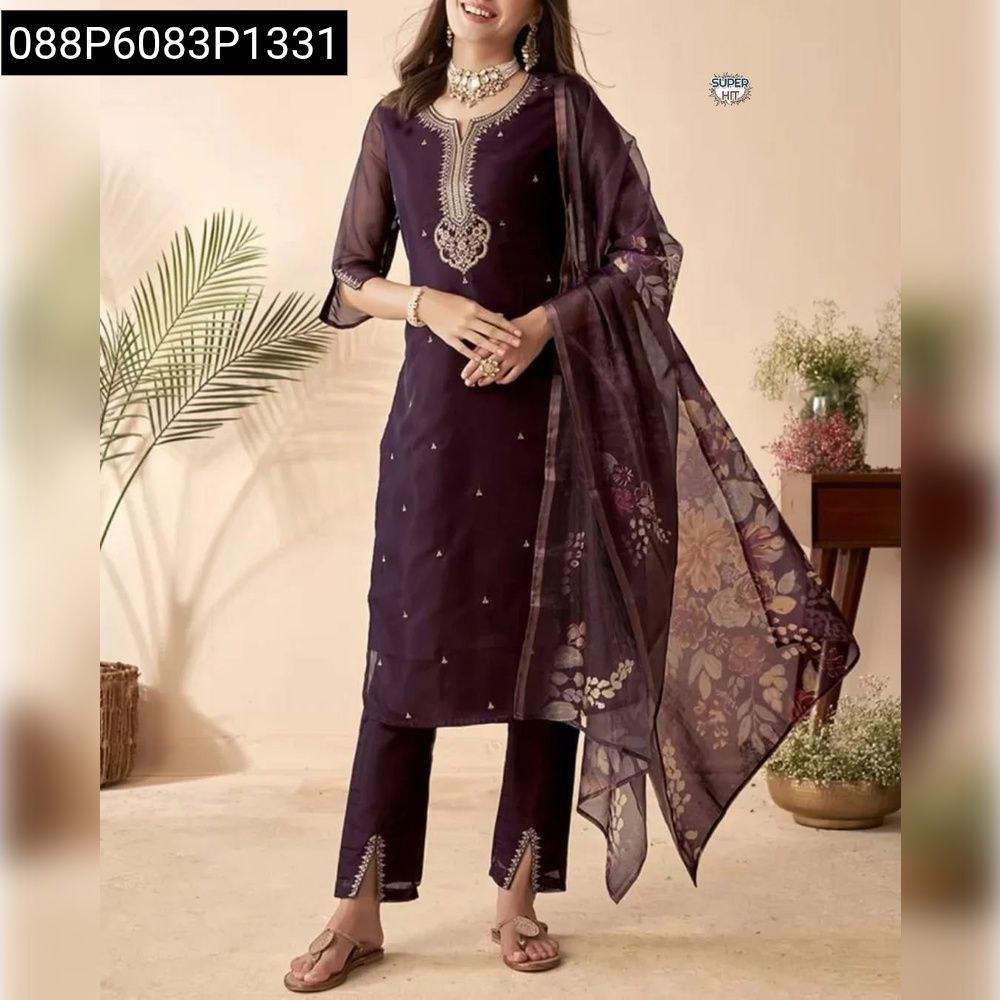 Full-body shot of a model standing, radiating elegance in the Plum Purple Chanderi Embroidered Suit Set with beautiful drape.