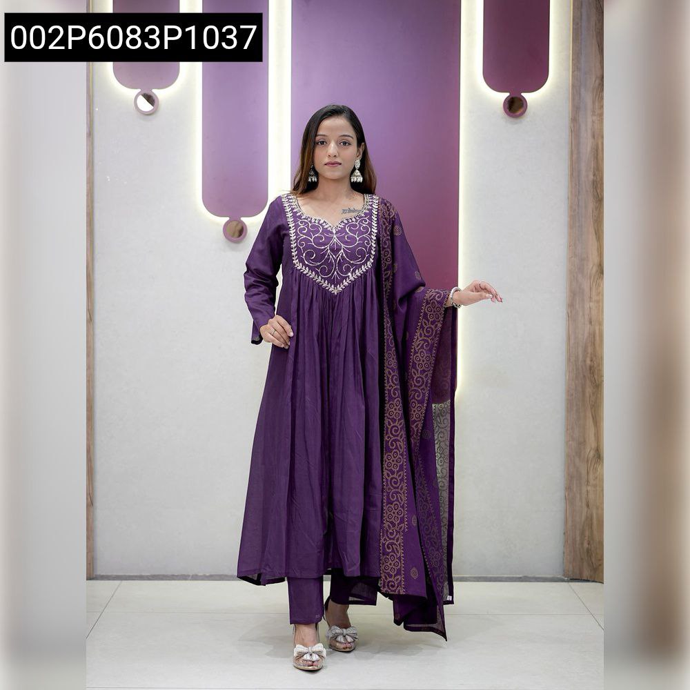 Woman posing in a full-length purple Chanderi Silk Anarkali Kurta Set with embroidered neckline and printed Chinon dupatta.