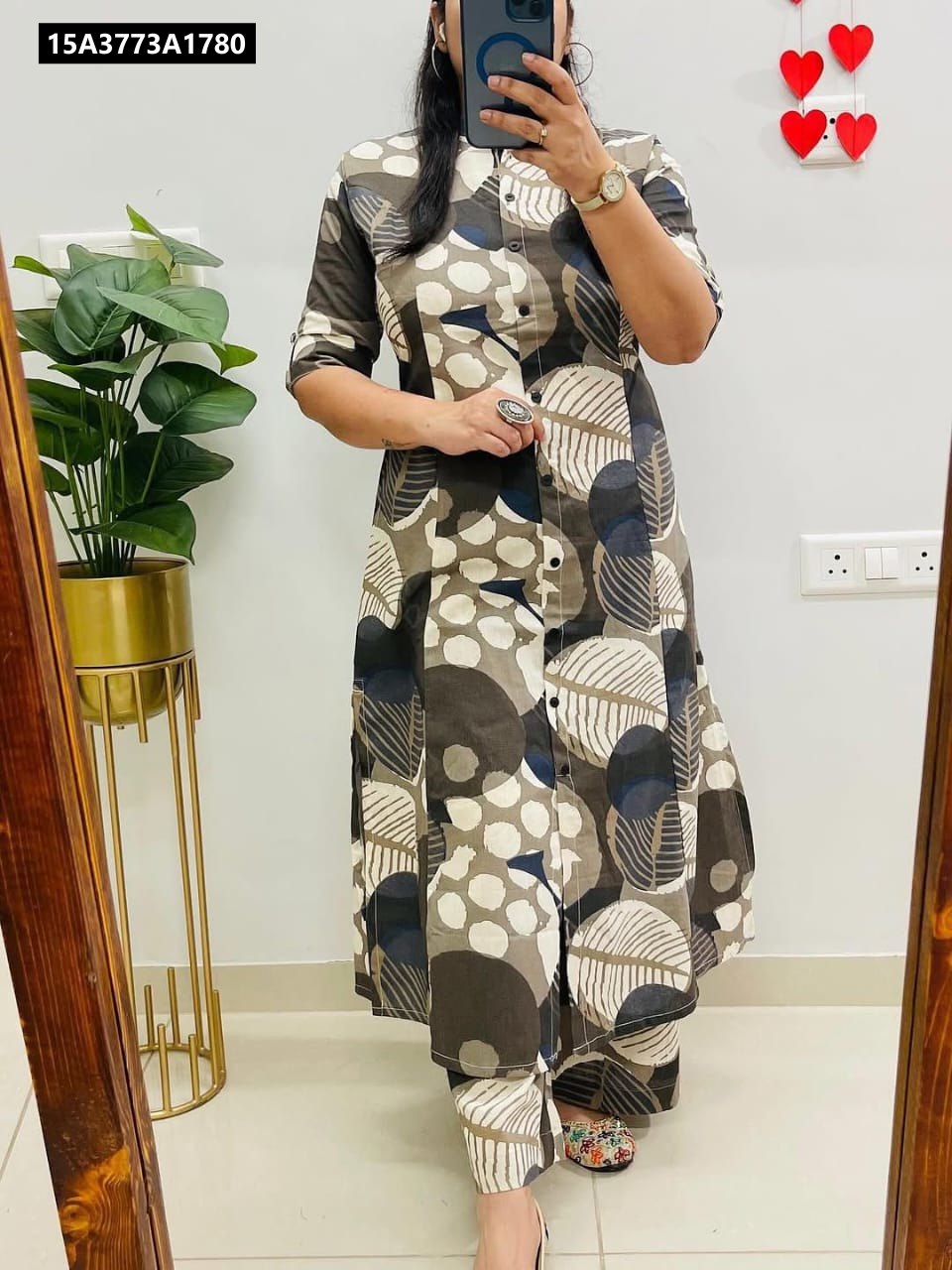 Model wearing a chic earthy abstract digital print co-ord set made from heavy poly rayon cotton, front view, perfect for casual outings.