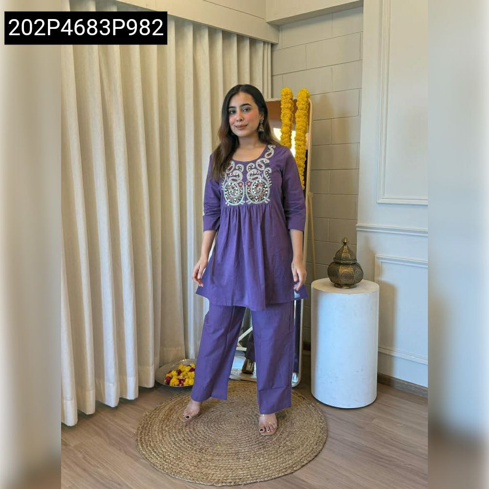 Model in a chic lavender cotton cord set with intricate embroidery, full body shot