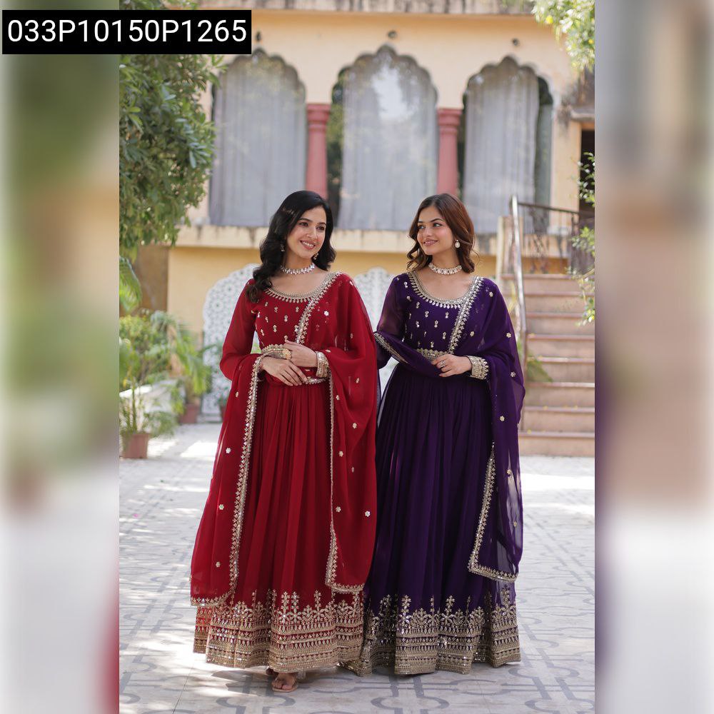 Two women posing in embroidered Maroon and Deep Purple gowns, outdoor setting