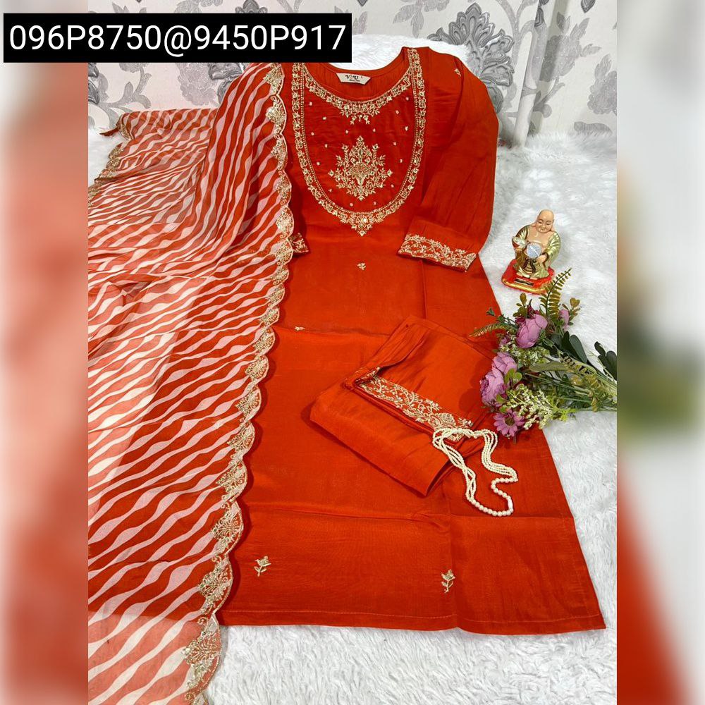 Vibrant Orange Muslin Silk Kurti Pant Set with White and Orange Striped Lehriya Dupatta, ready for festive occasions.