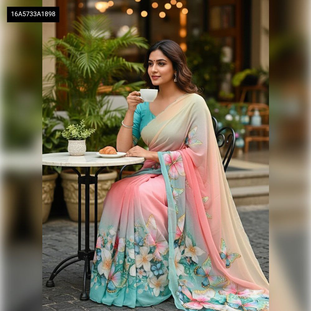 Model wearing TRENDBUY Teal Ombre Butterfly Chiffon Saree with handwork, perfect for festive occasions, seated