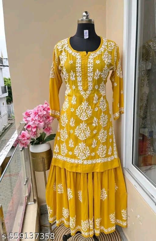 Yellow Chikankari Embroidered Kurti Sharara Set on mannequin